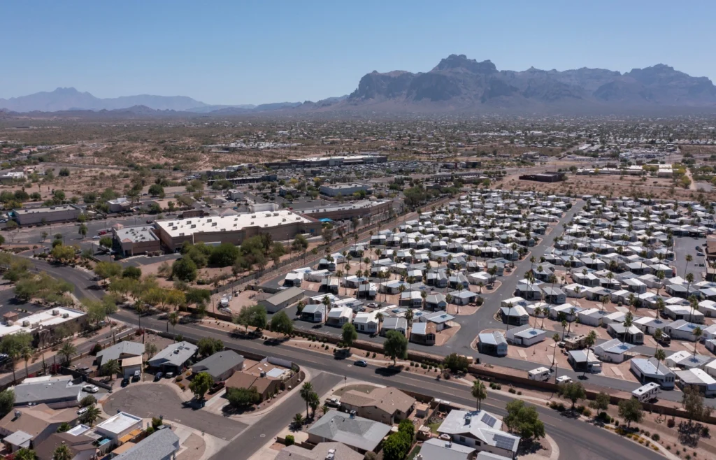 Aerial view of Apache Junction neighborhoods below the Superstition Mountains